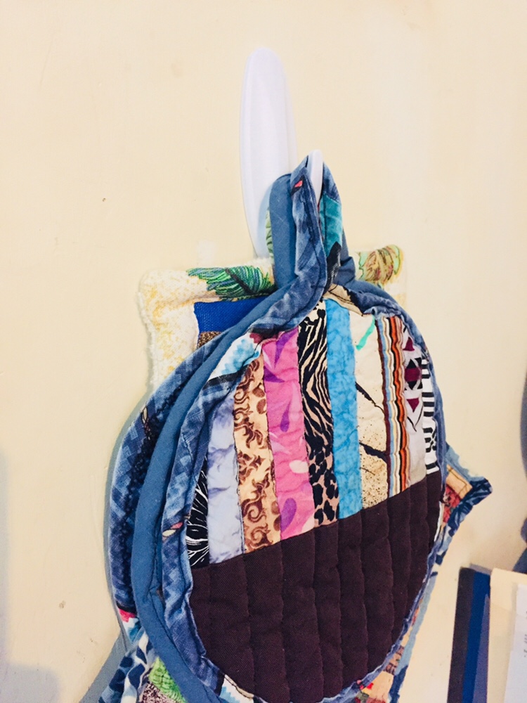Command hooks holding potholders