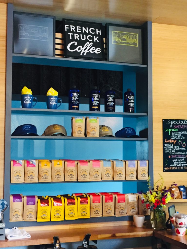 Wall of French Truck Coffee on shelves