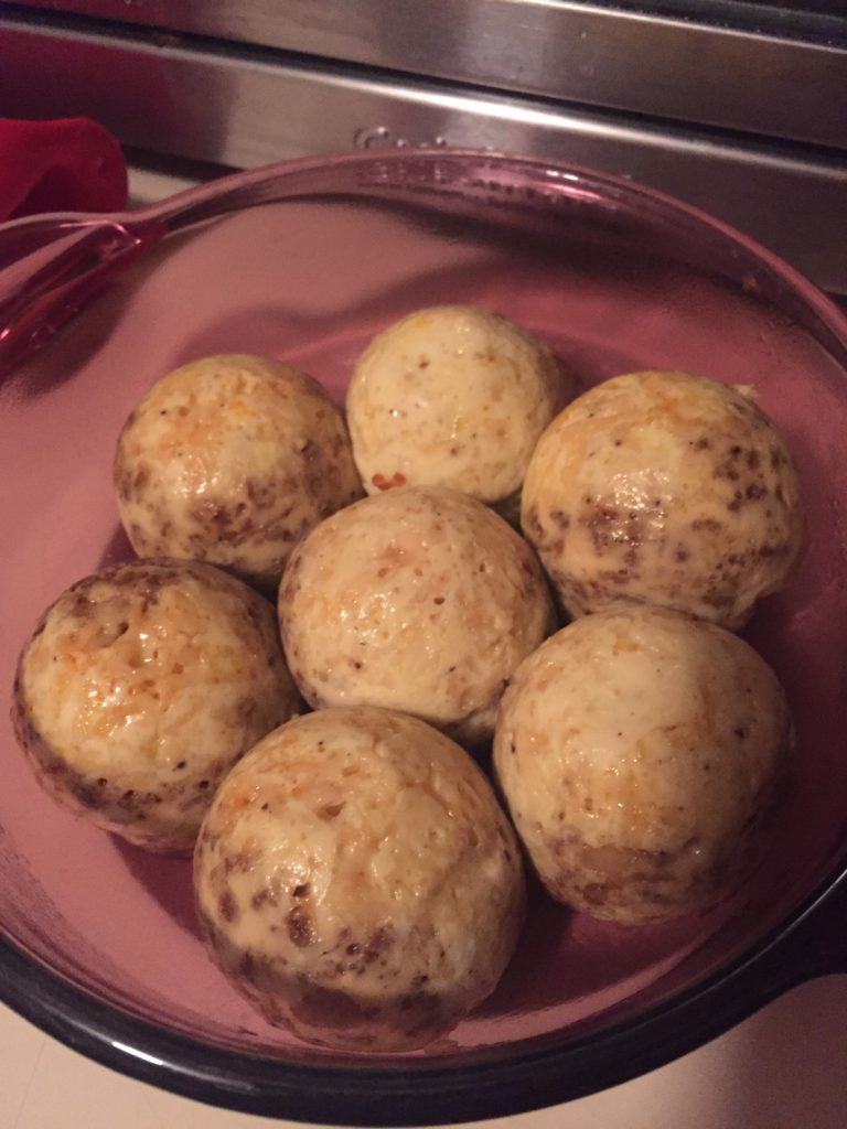 Cooked egg bites in red dish