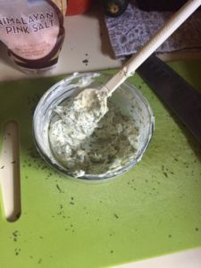 Tarragon butter mixed in container