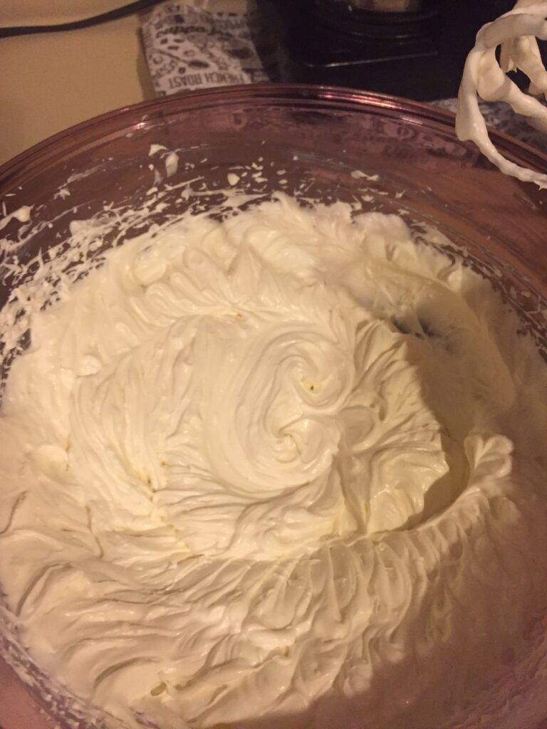 Well mixed cheesecake filling in bowl
