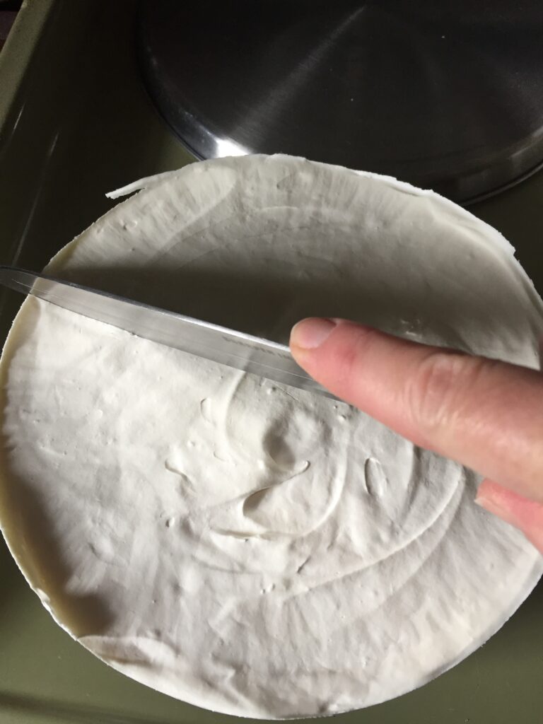 Cutting into the cheesecake