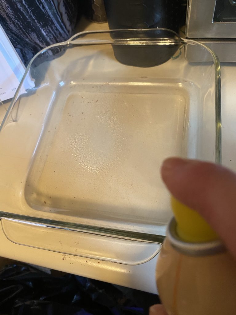 Spraying baking pan