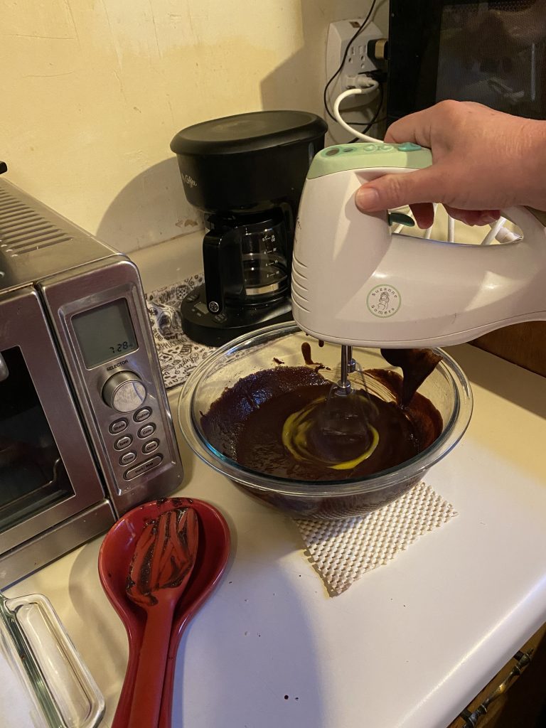 Blending eggs and chocolate