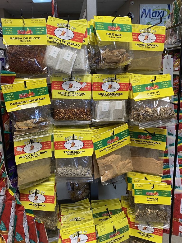 Spice packets hanging on rack