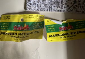 Empty packets of raw almonds and pepitas
