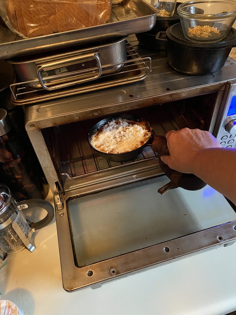 Adding pan into oven