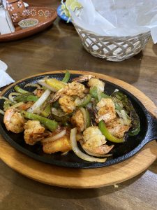 shrimp fajitas on hot plate