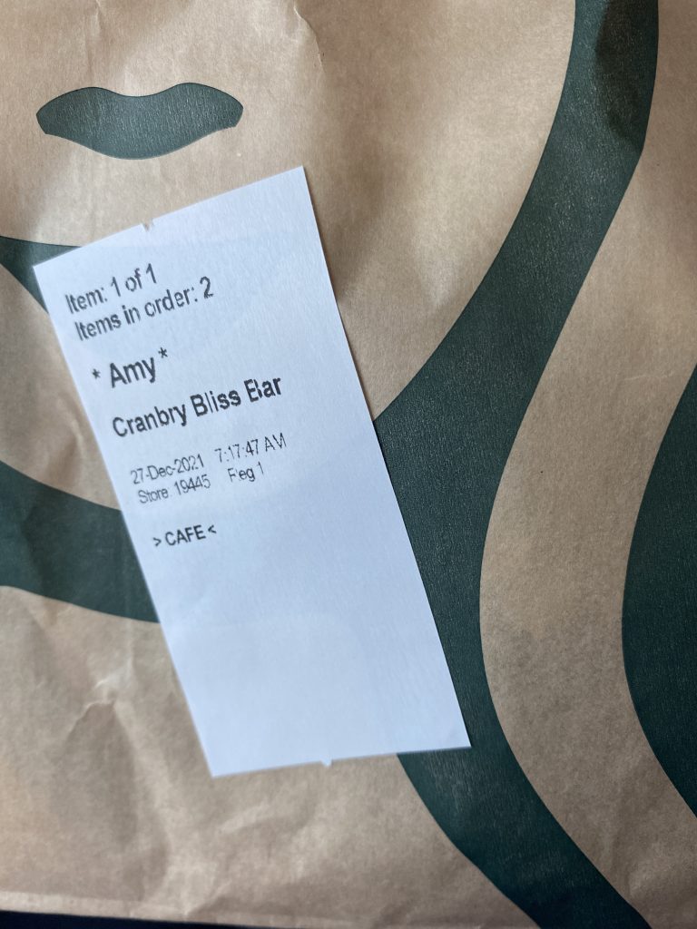 Starbucks bag with cranberry bliss bar on label