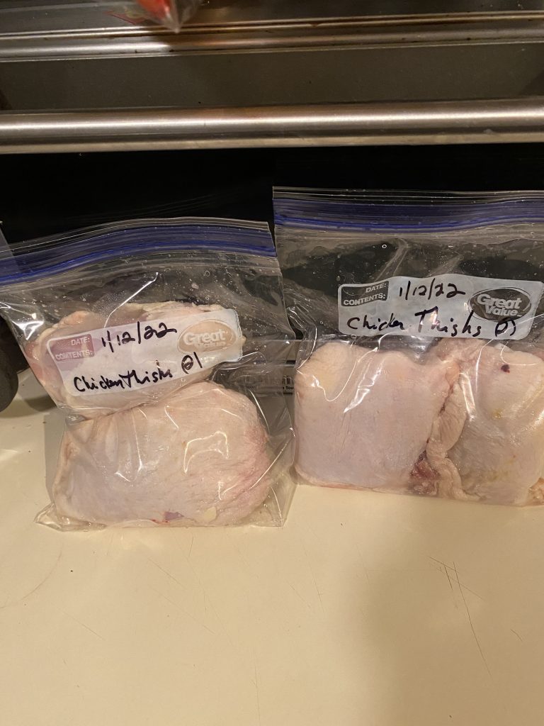 Two bags of chicken thighs for the freezer