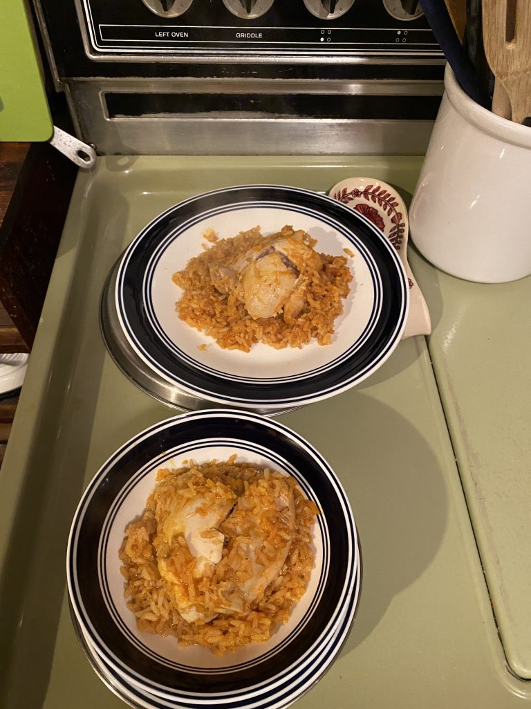 Two plates of Arroz Con Pollo 