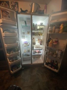 Refrigerator with doors open