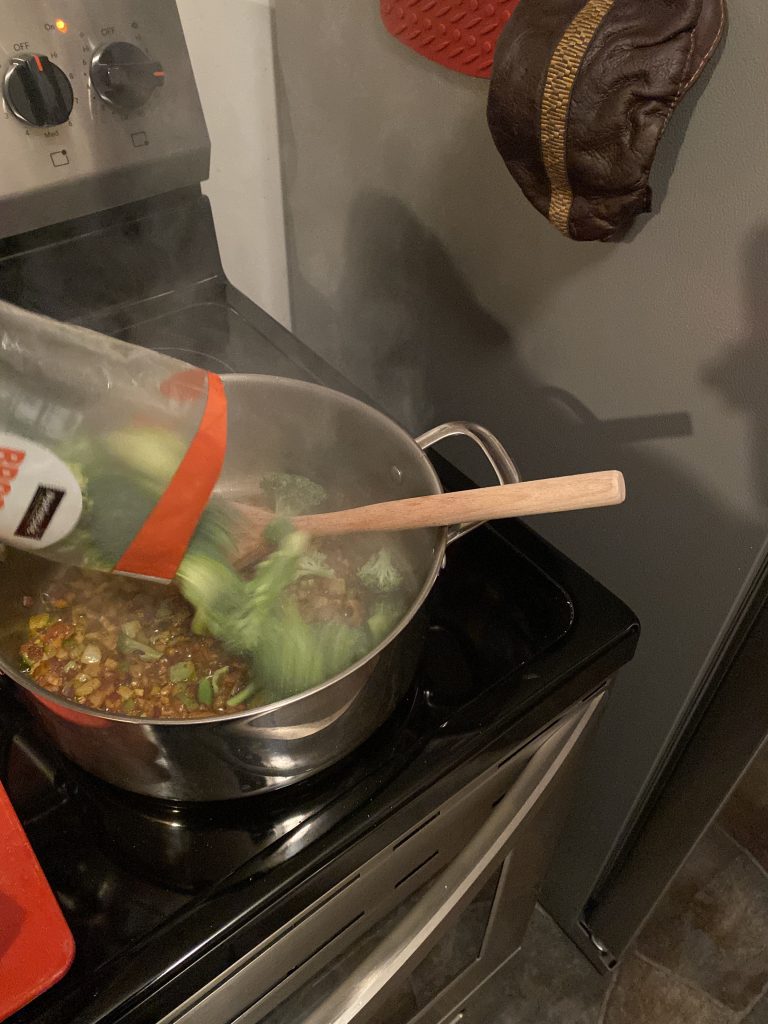 Adding broccoli into soup
