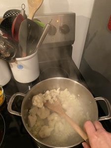 Sauteing cauliflower in pot