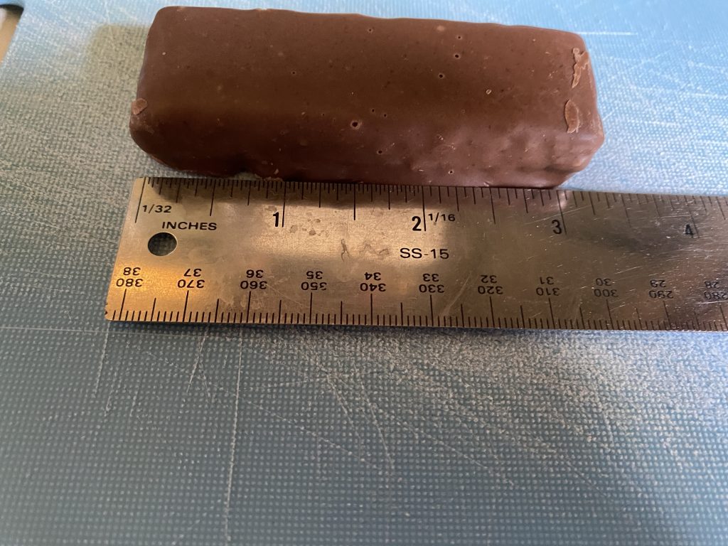 Ruler measuring three inch Keto think! chocolate mousse pie bar