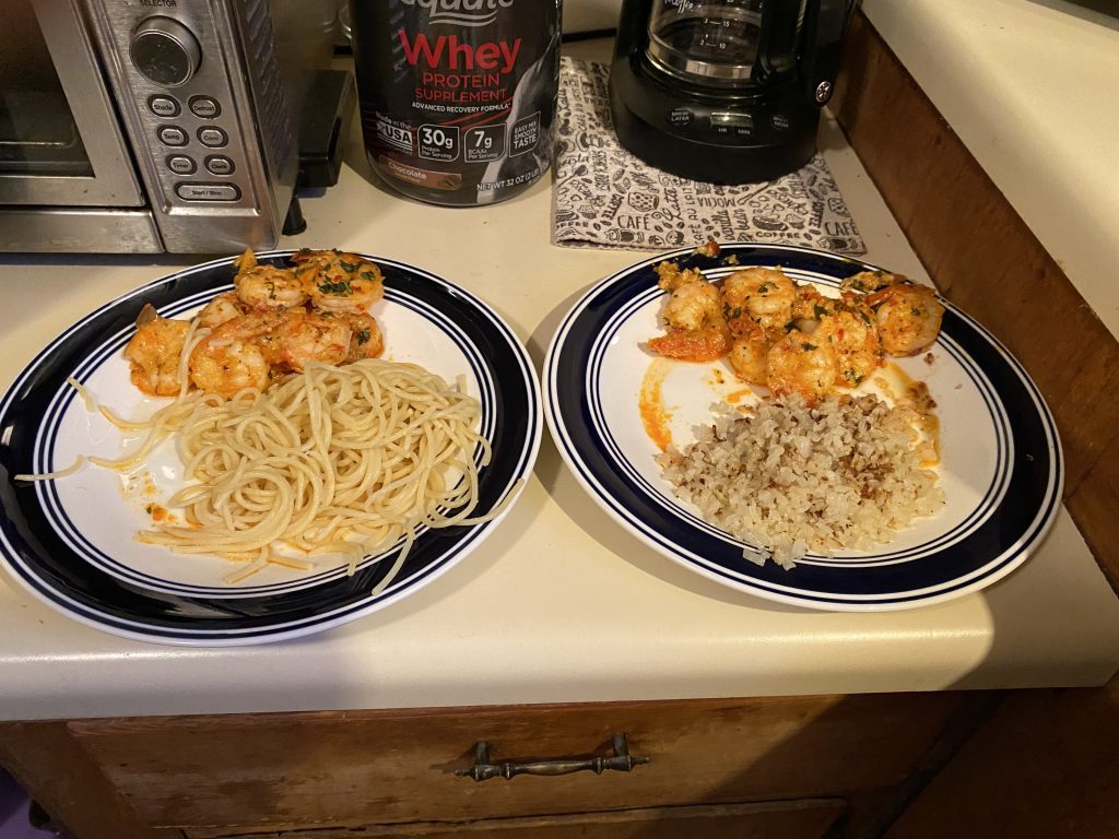 Two plates of spicy calabrian shrimp