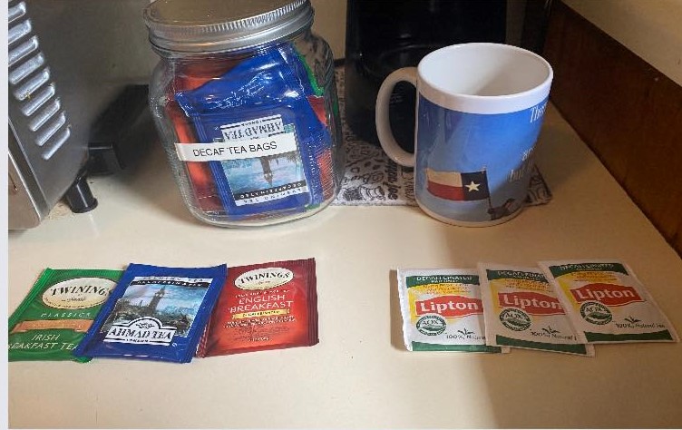 jar with variety of decaf tea bags
