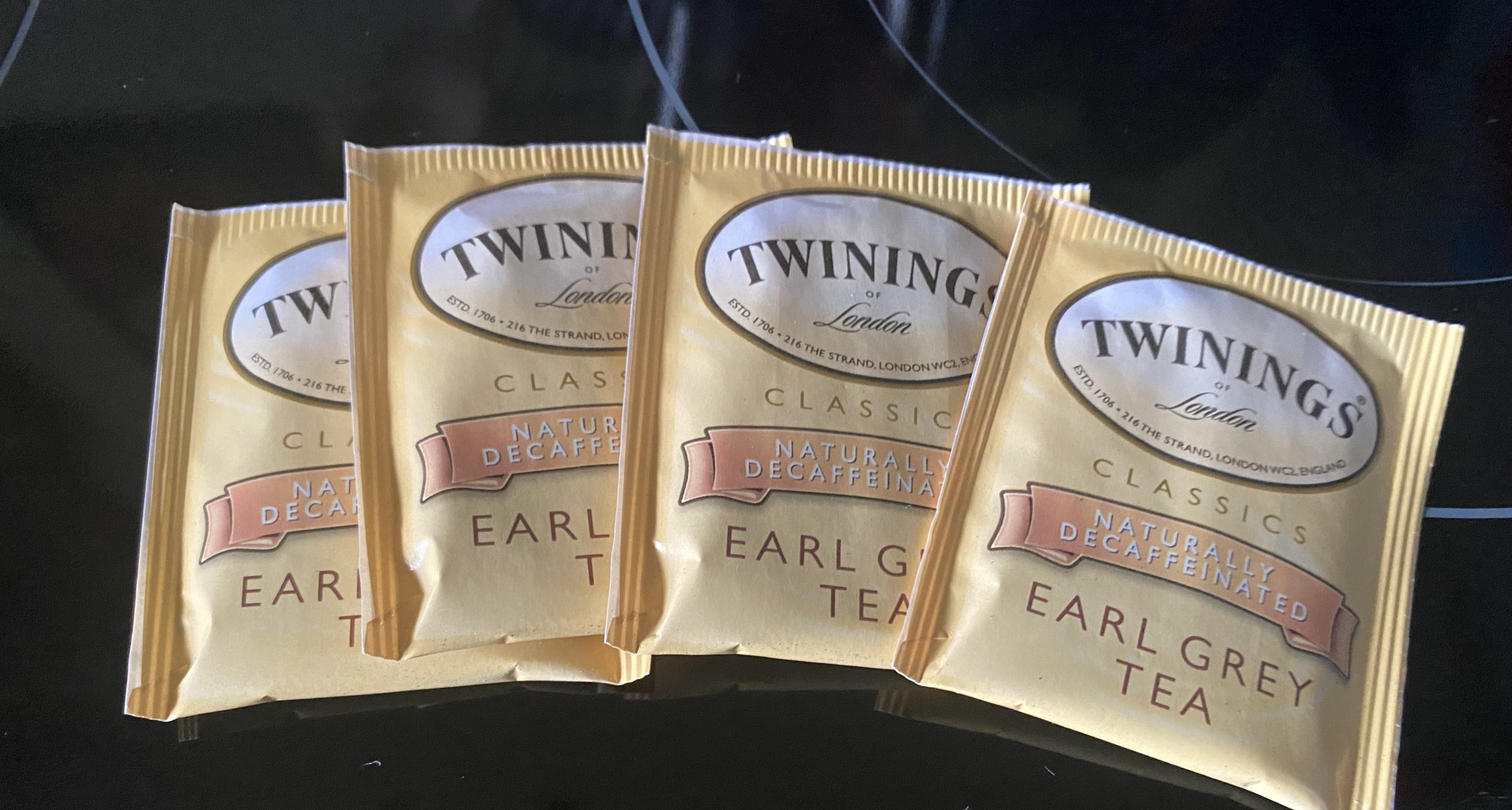 Four packets of Twinnings decaf Earl Grey Tea