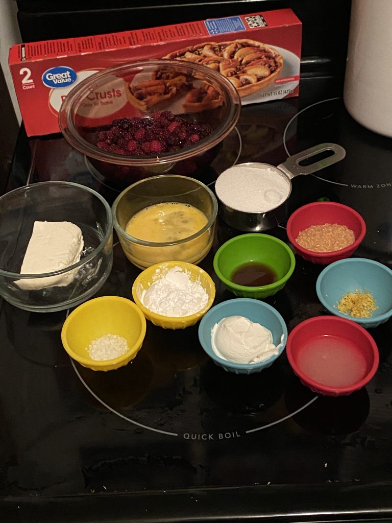 Ingredients for the cheesecake topping mixture for blackberry cheesecake galette