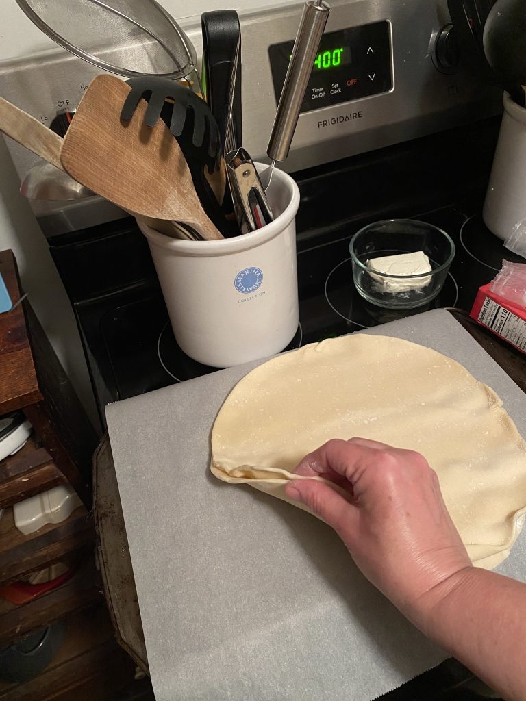 Flattening the pie crusts