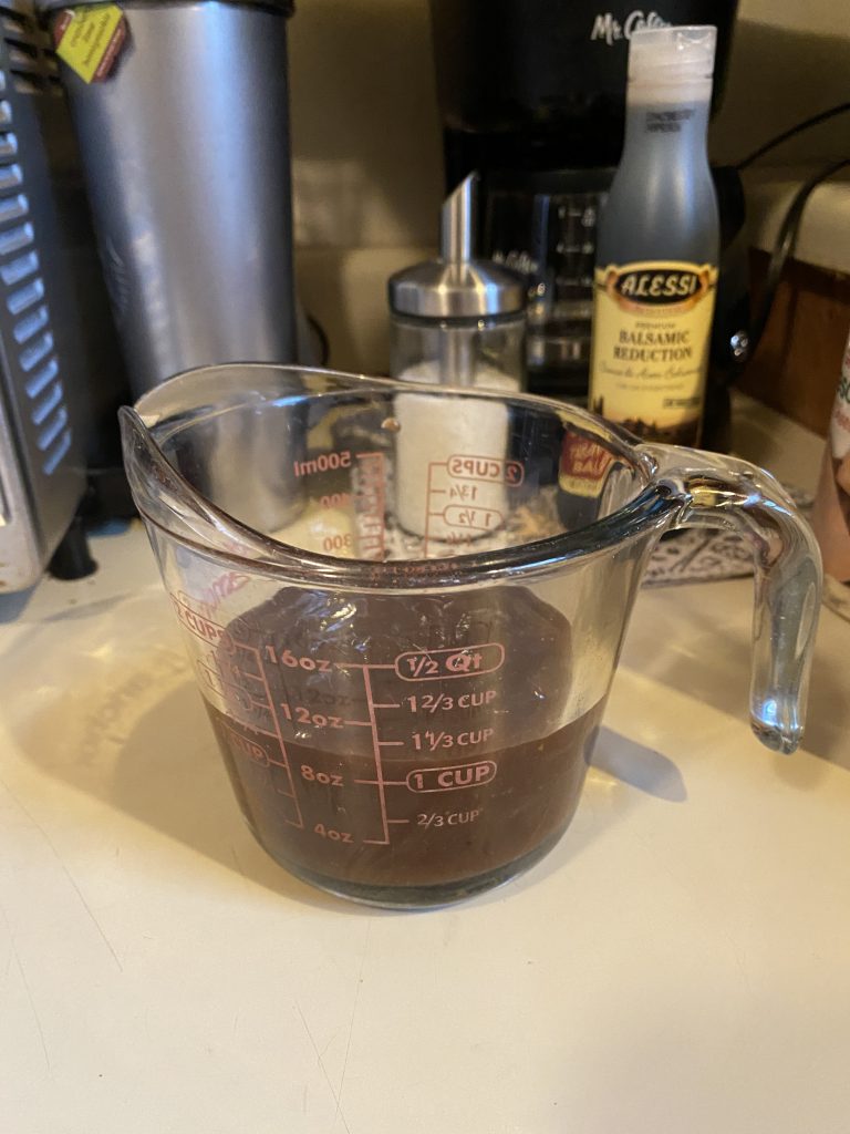Barbecue sauce in measuring cup