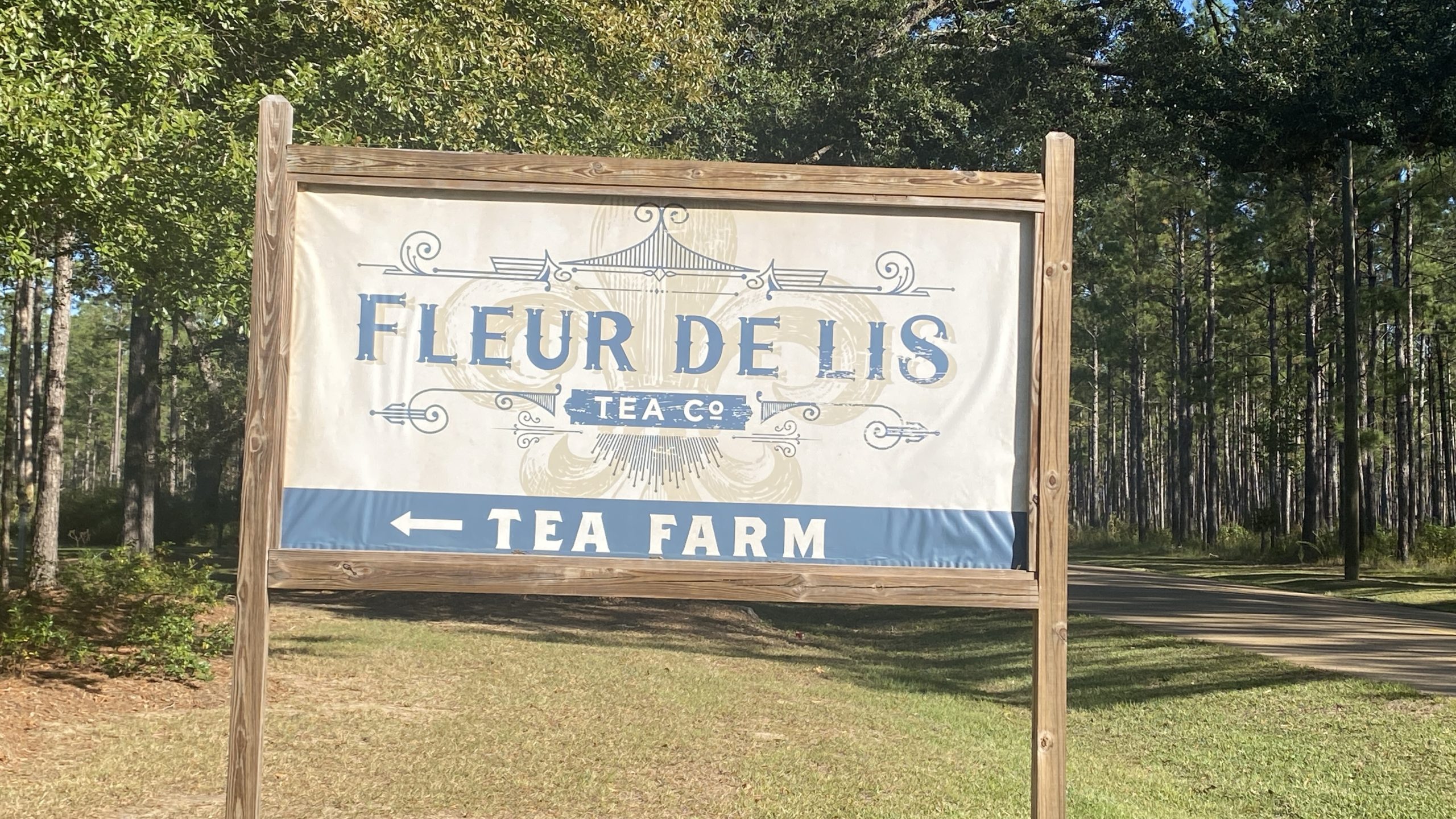Sign for Fleur De Lis Tea Farm sign on North Cooper Road