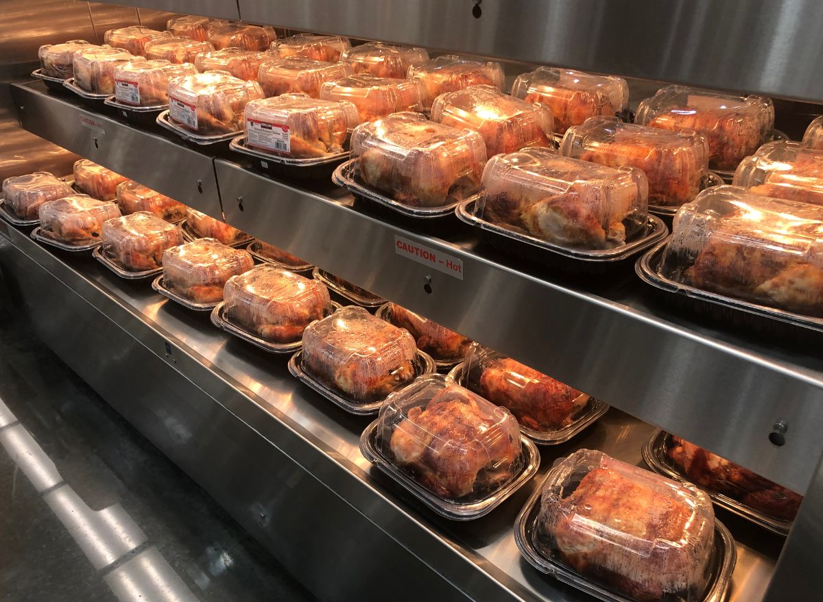 Rows of cooked rotisserie chickens in hot racks for impromptu keto meals